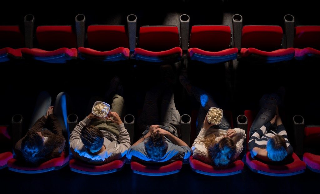 People watching in a film theatre