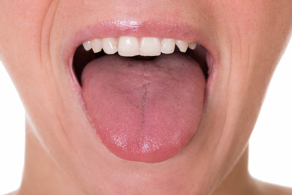 a person sticking their tongue out