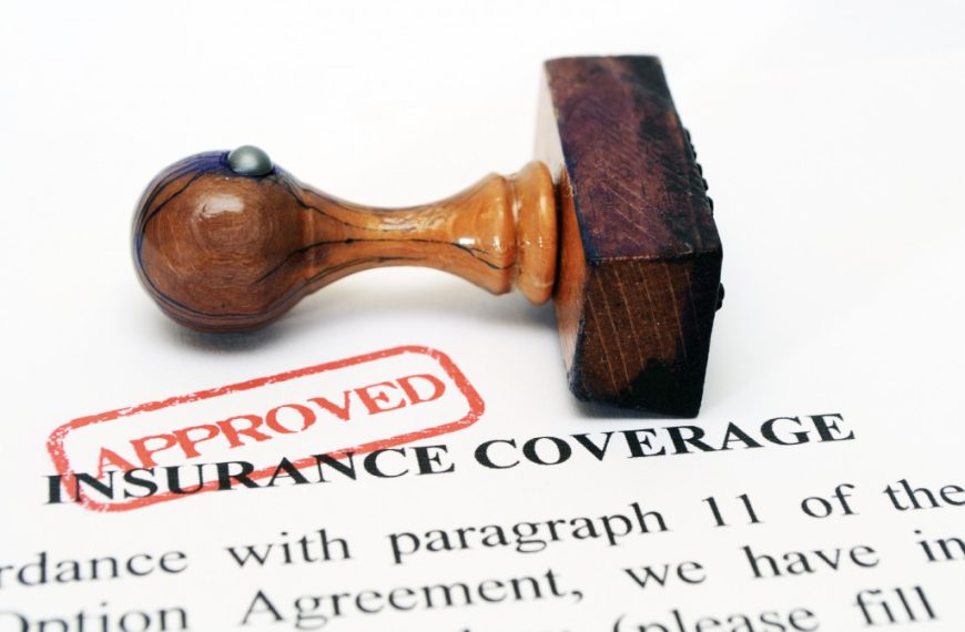 An insurance coverage document with an Approved stamp
