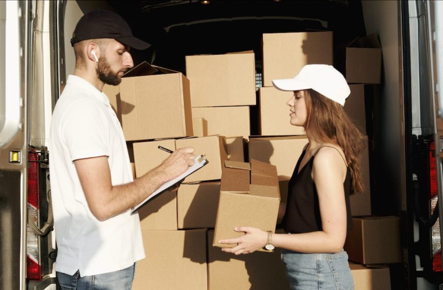 Man and Woman Checking the Packages